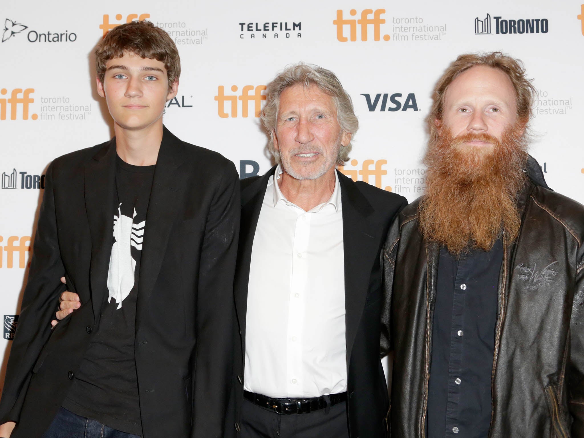 Jack Waters, director/musician Roger Waters and musician Harry Waters attend the "Roger Waters The Wall" premiere during the 2014 Toronto International Film Festival