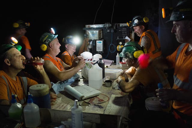 Miners working at the face of a potash seam take a short break at the Boulby Potash mine in Boulby, United Kingdom.