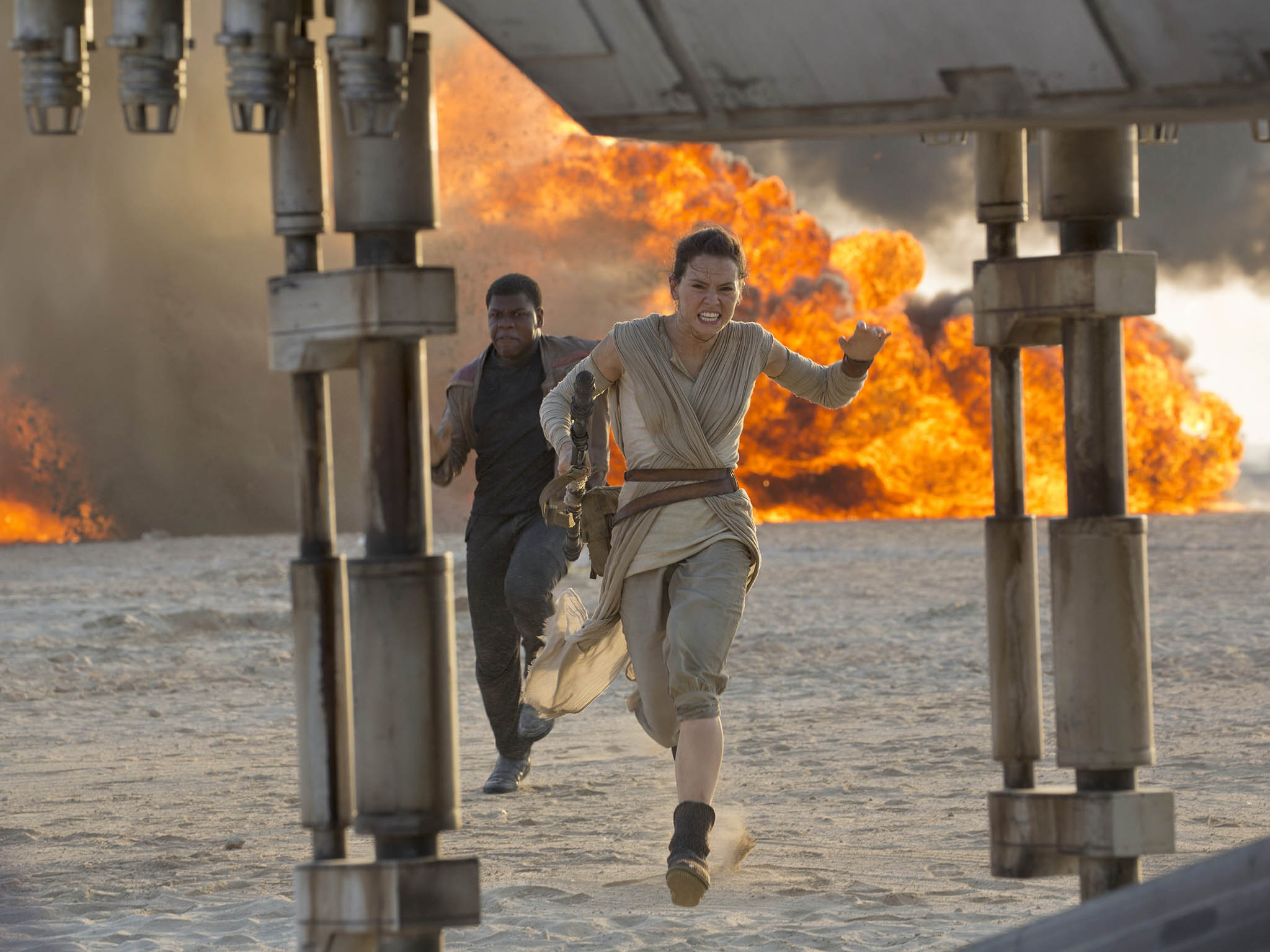 Daisy Ridley and John Boyega as Rey and Finn in Star Wars: The Force Awakens