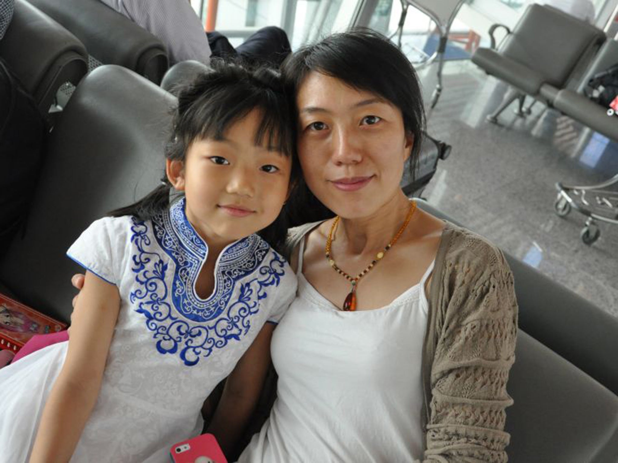 Gao Yushuang with her daughter, Muti, eight