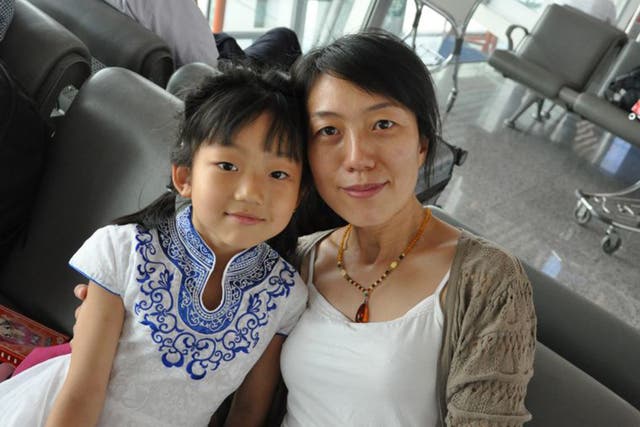 Gao Yushuang with her daughter, Muti, eight