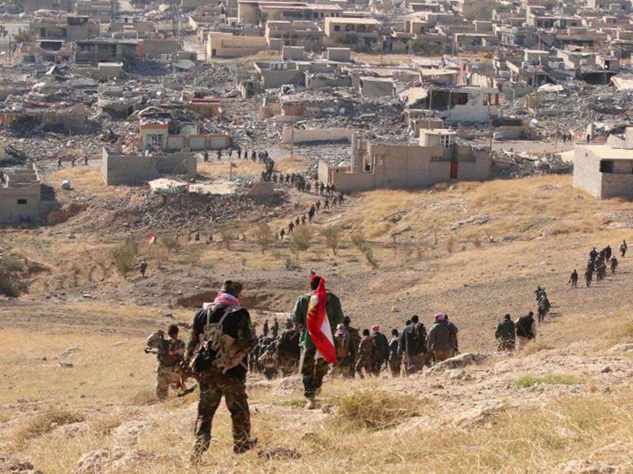 Kurdish peshmerga forces secured several strategic facilities in the northern Iraqi town of Sinjar on Friday