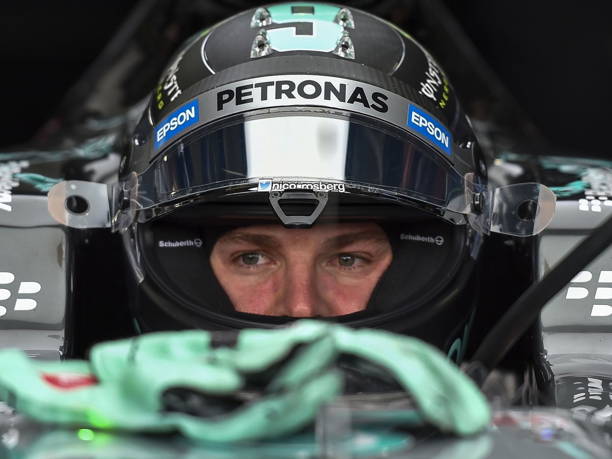 Mercedes' driver Nico Rosberg powers his car before the free practices