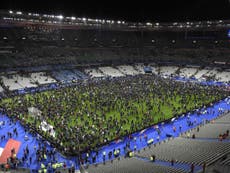 French football fans sing national anthem during evacuation 