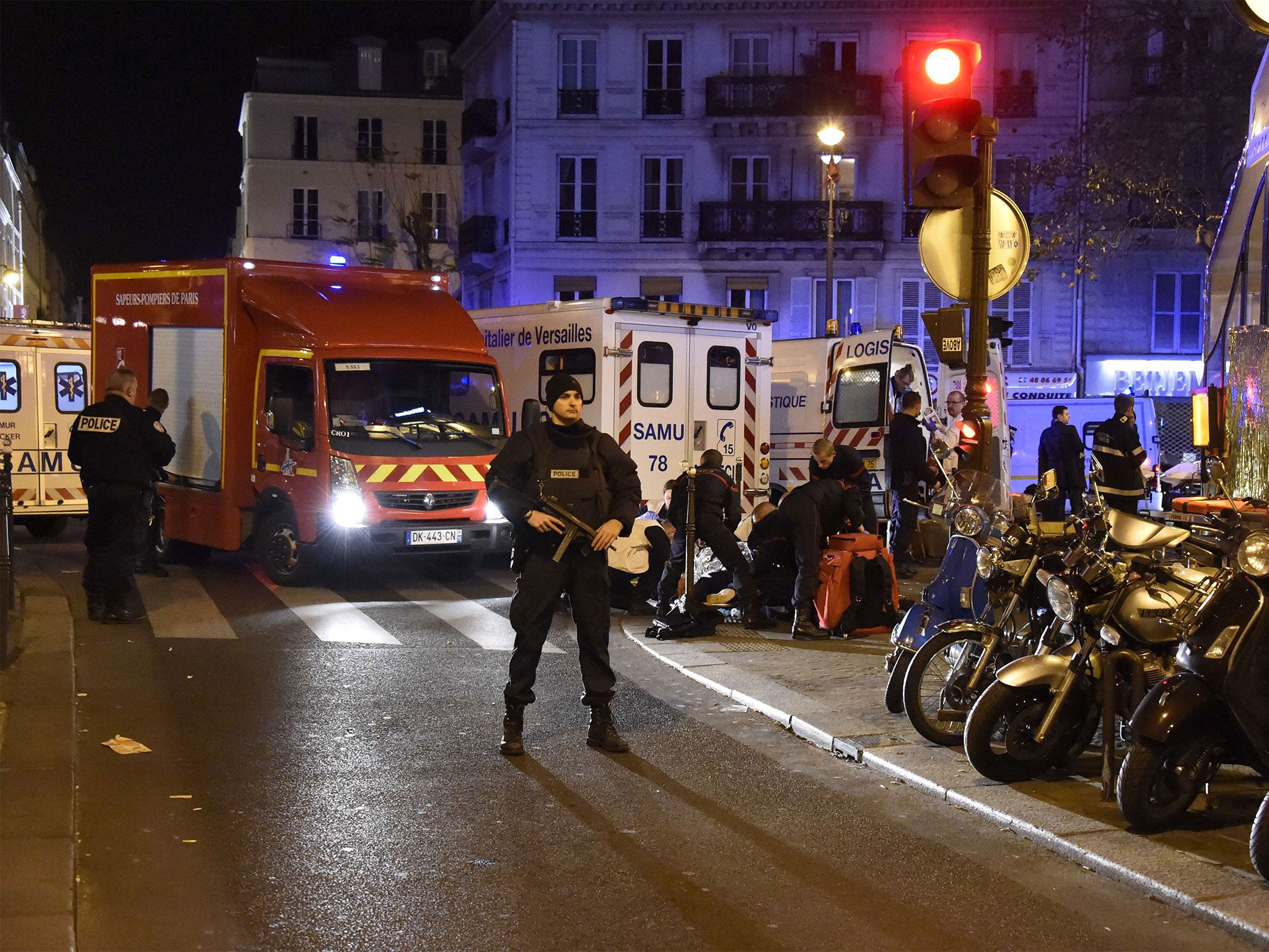Police stand guard near the Bataclan concert hall