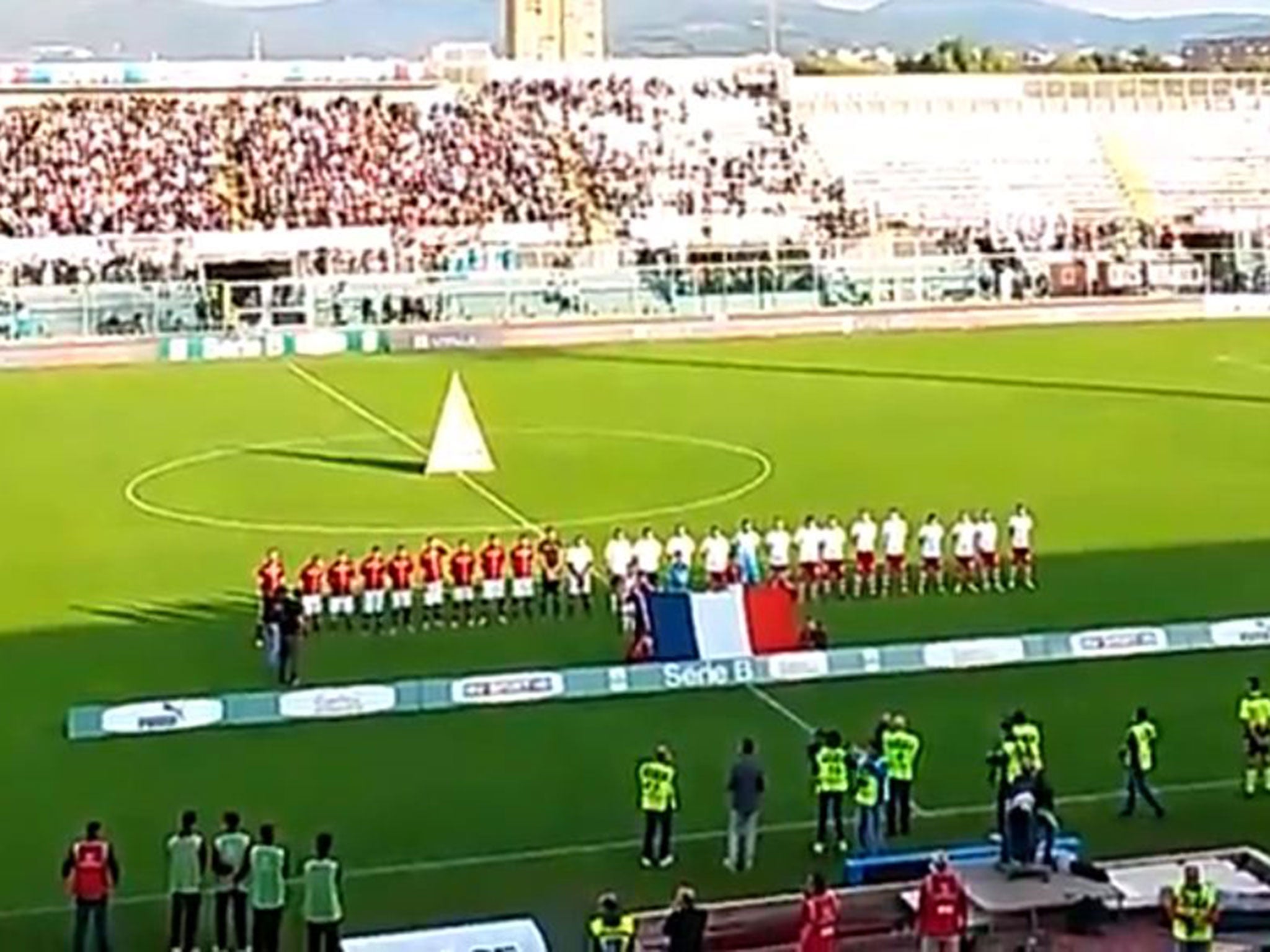 Livorno and Vincenza players pay tribute to the victims of the Paris terror attacks