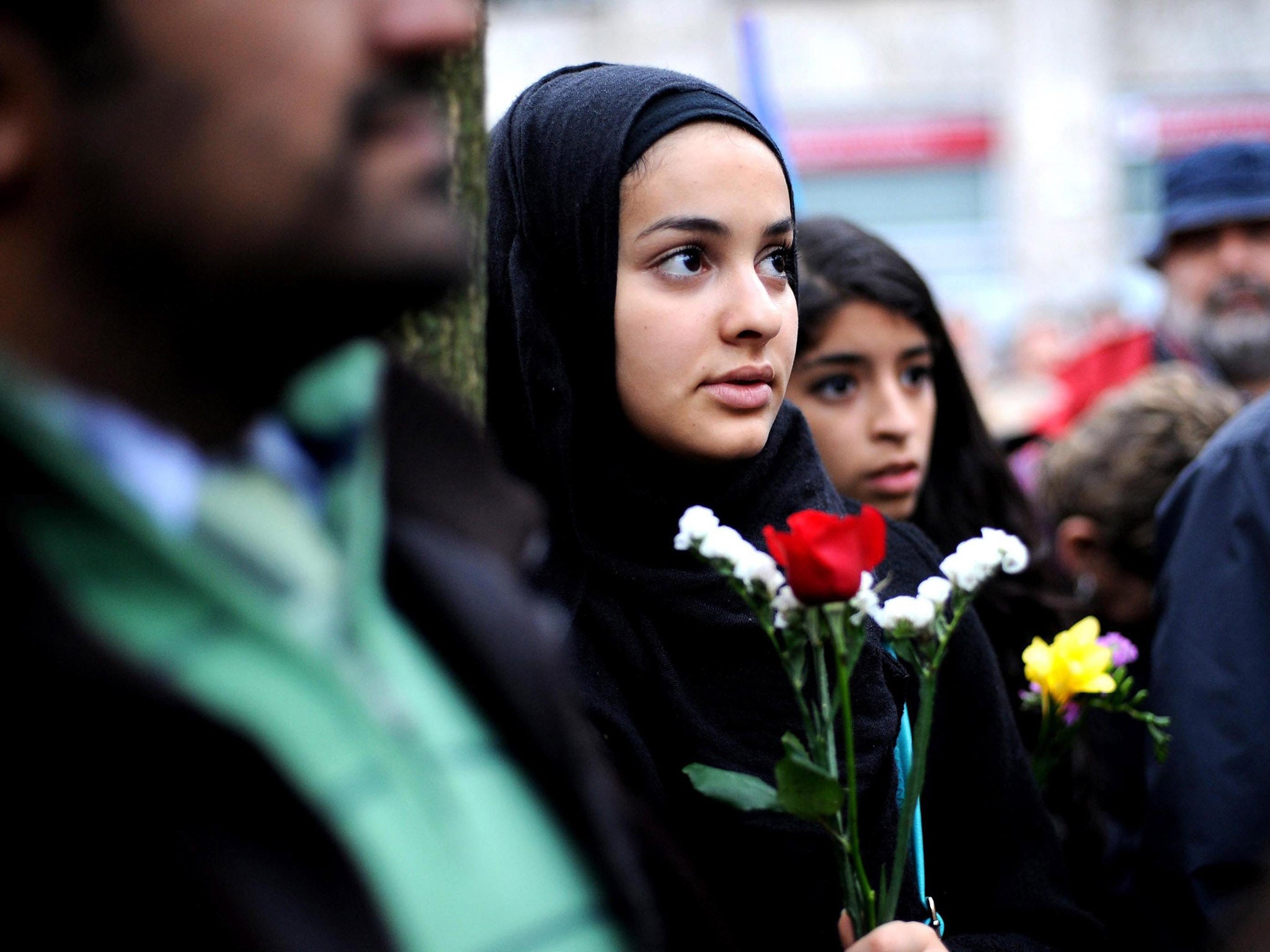 People gather in a solidarity rally with the French people in the aftermath of the Paris terror attacks