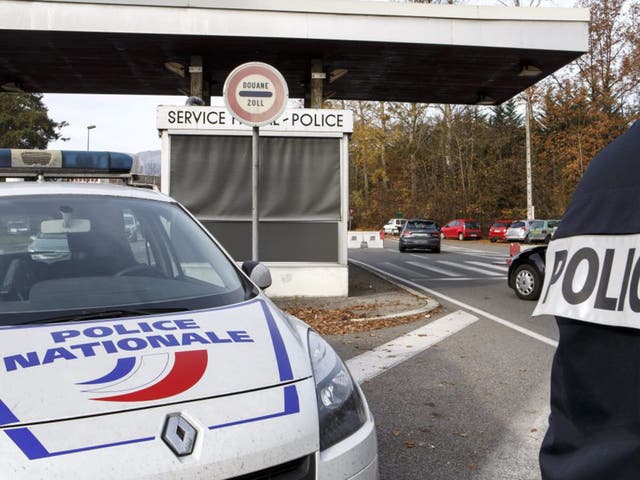 French Border control police check cars at the border between France and Switzerland in Meyrin near Geneva, Switzerland, 14 November 2015