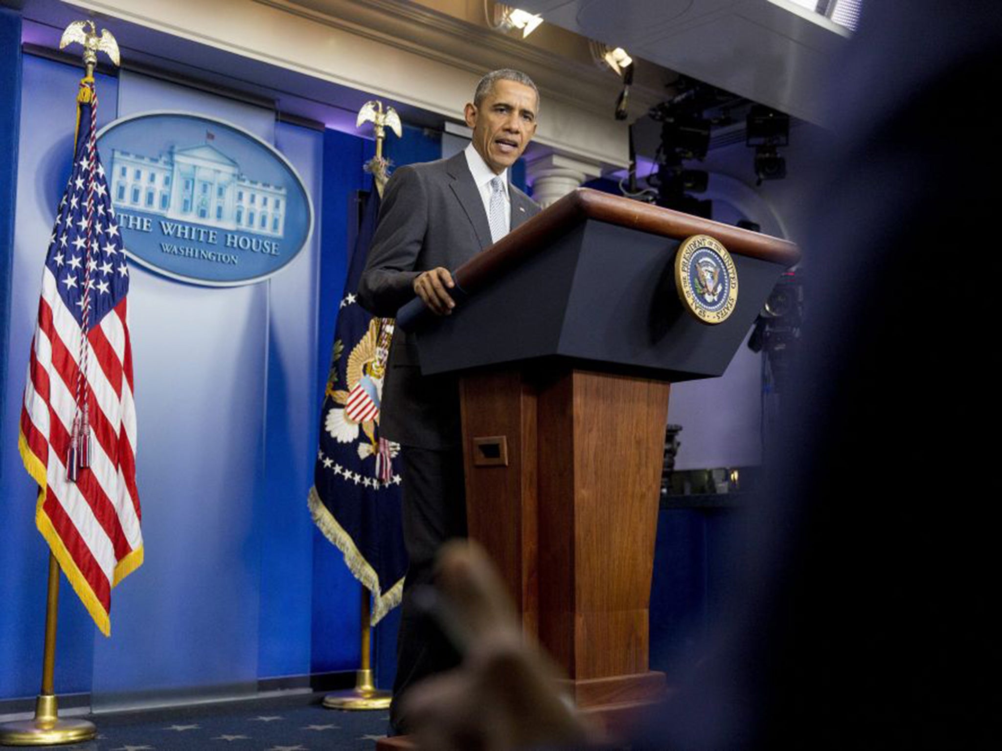 U.S. President Barack Obama makes a statement about multiple acts of violence in Paris in the Brady Press Briefing Room of the White House