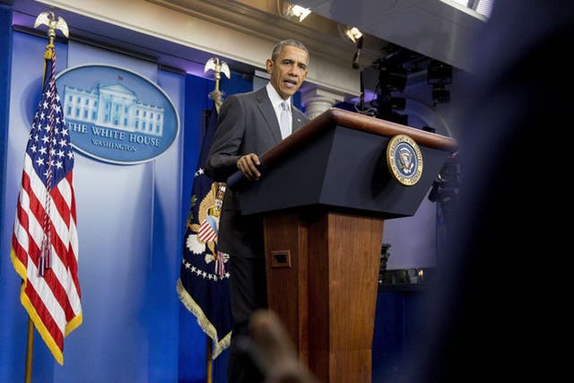 U.S. President Barack Obama makes a statement about multiple acts of violence in Paris in the Brady Press Briefing Room of the White House