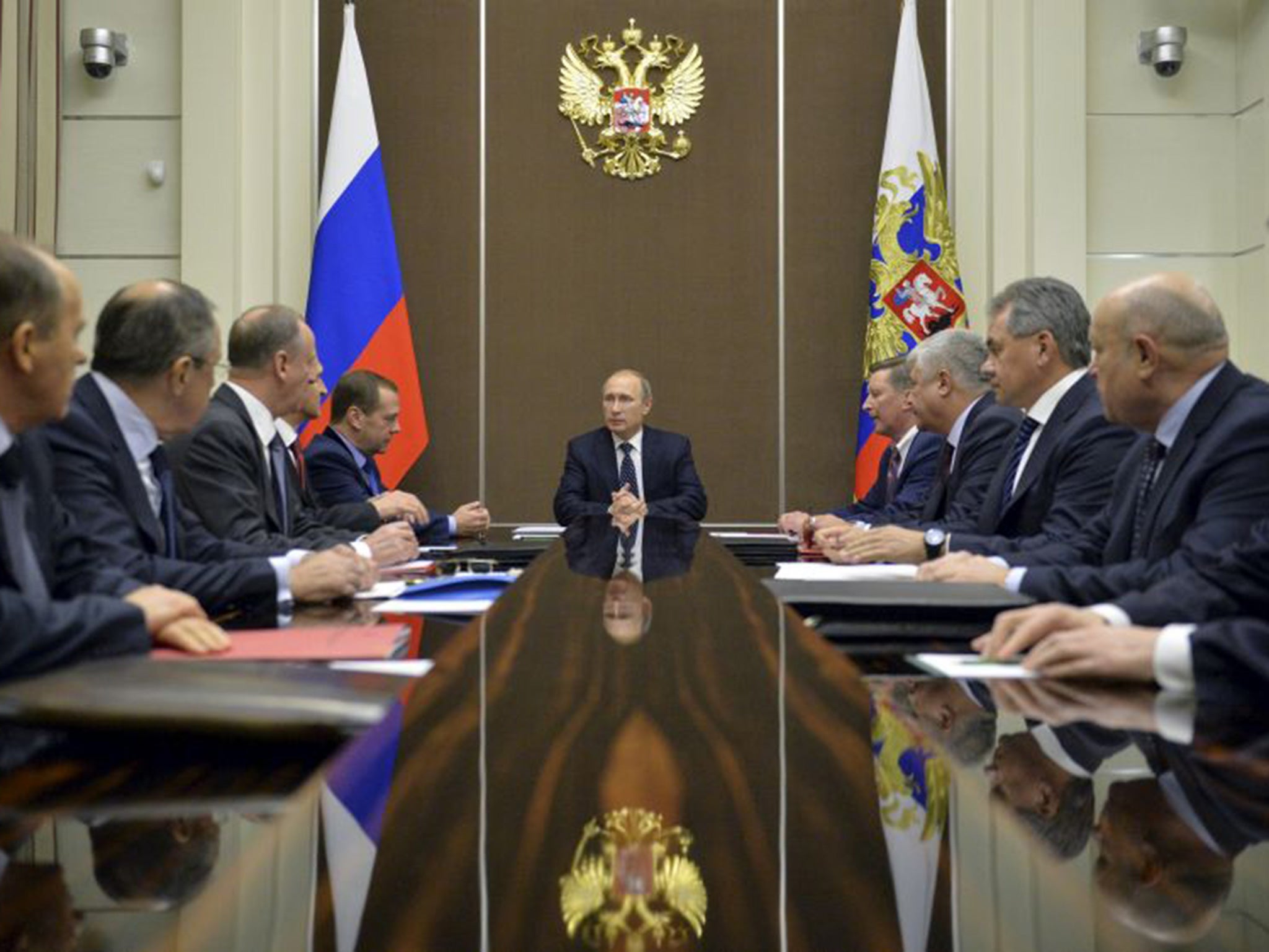 Russian President Vladimir Putin chairs a Security Council meeting