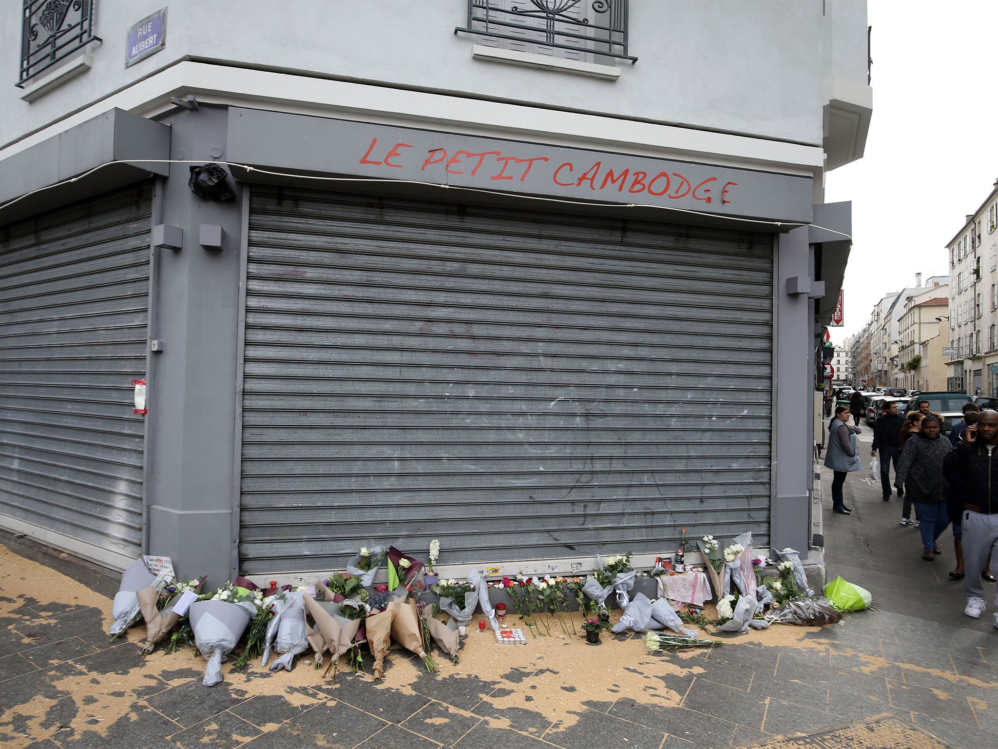 Tributes left outside Le Petit Cambodge, Paris, one of the venues for the attacks in the French capital.
