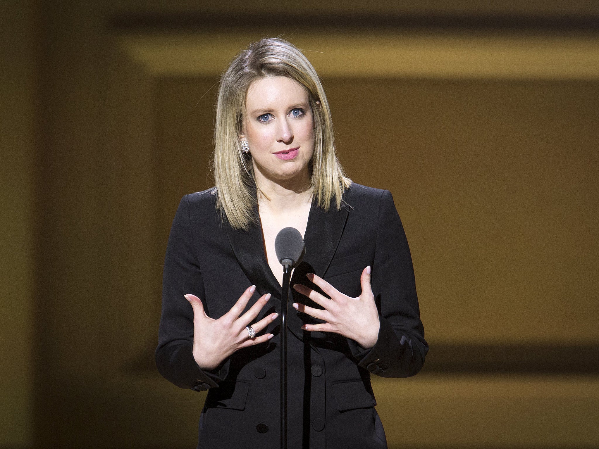 Theranos Chief Executive Officer Elizabeth Holmes speaks on stage at the Glamour Women of the Year Awards in New York