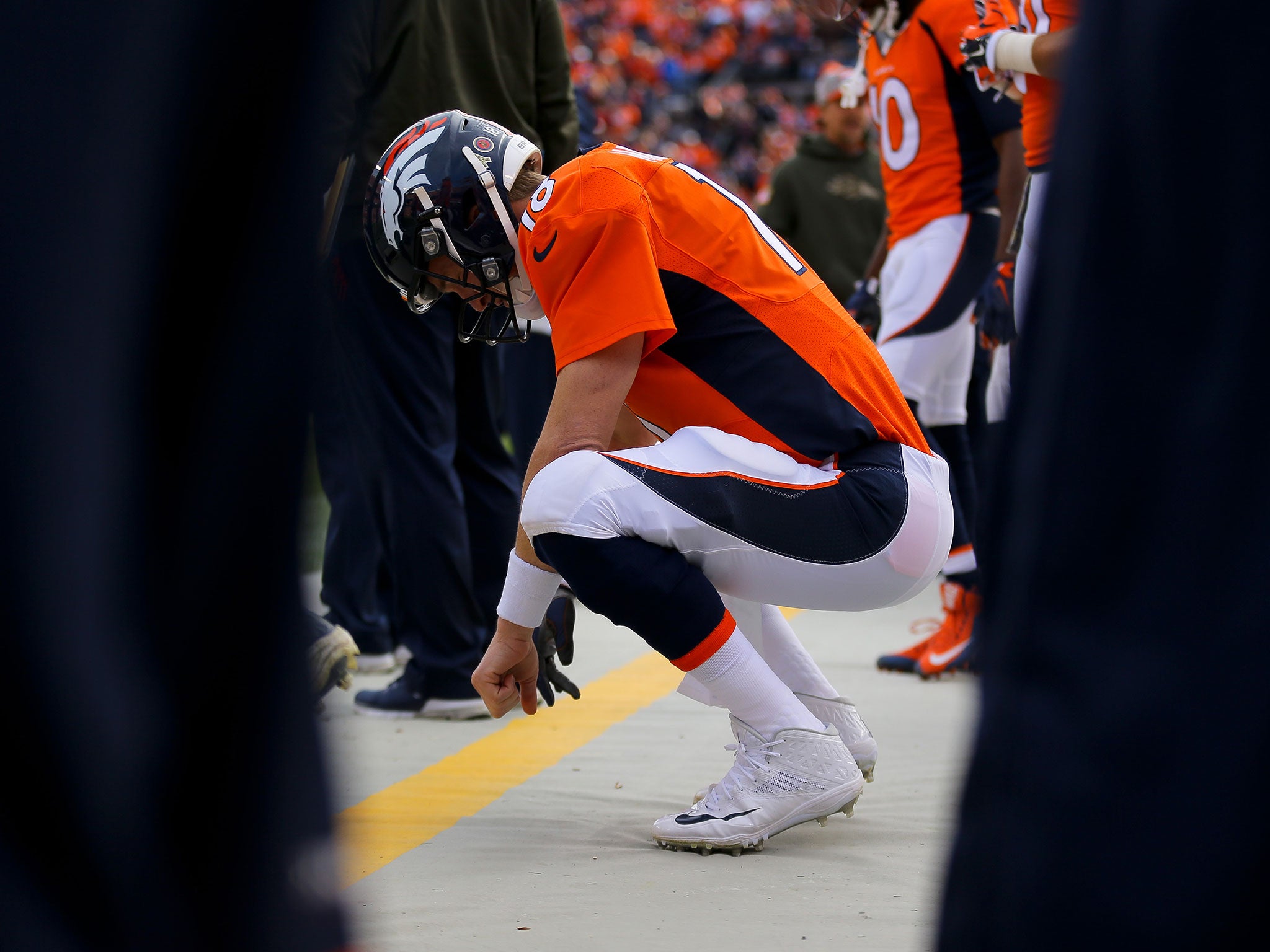 Peyton Manning was benched for the Denver Broncos despite beating Brett Favre's passing record