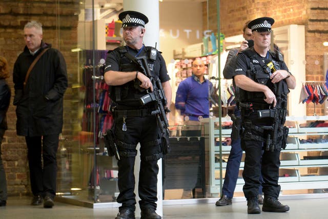 Armed police at St Pancras International Station in London