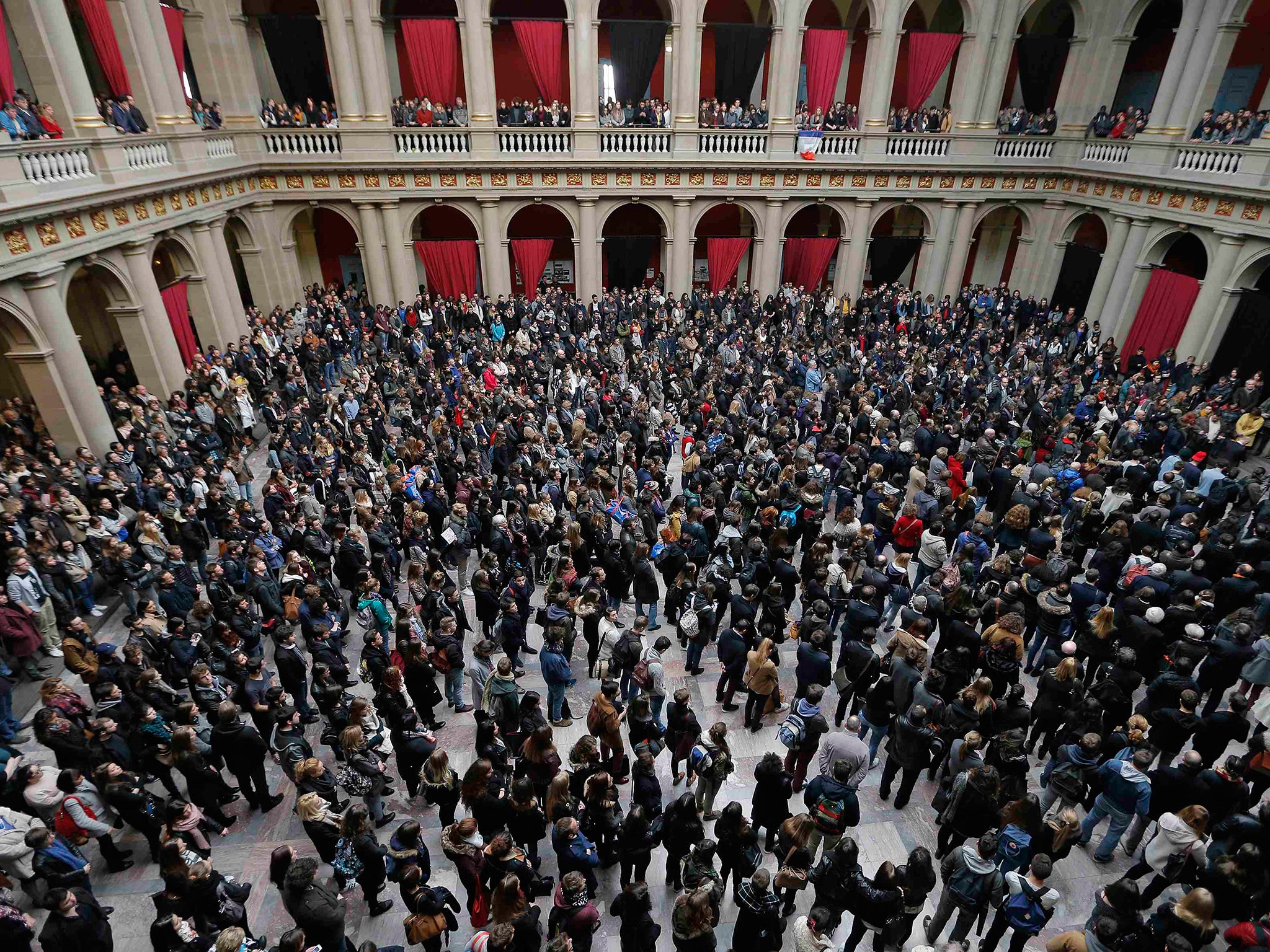 Students and teachers of Strasbourg University observe a minute of silence at the "Palais Universitaire" in Strasbourg, to pay tribute to victims of the Paris attacks