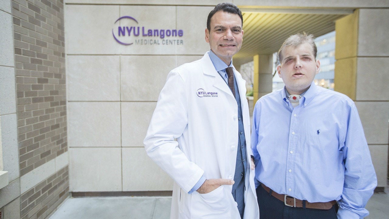 Dr. Eduardo D. Rodriguez, left, pictured with his face transplant patient Patrick Hardison at NYU Langone