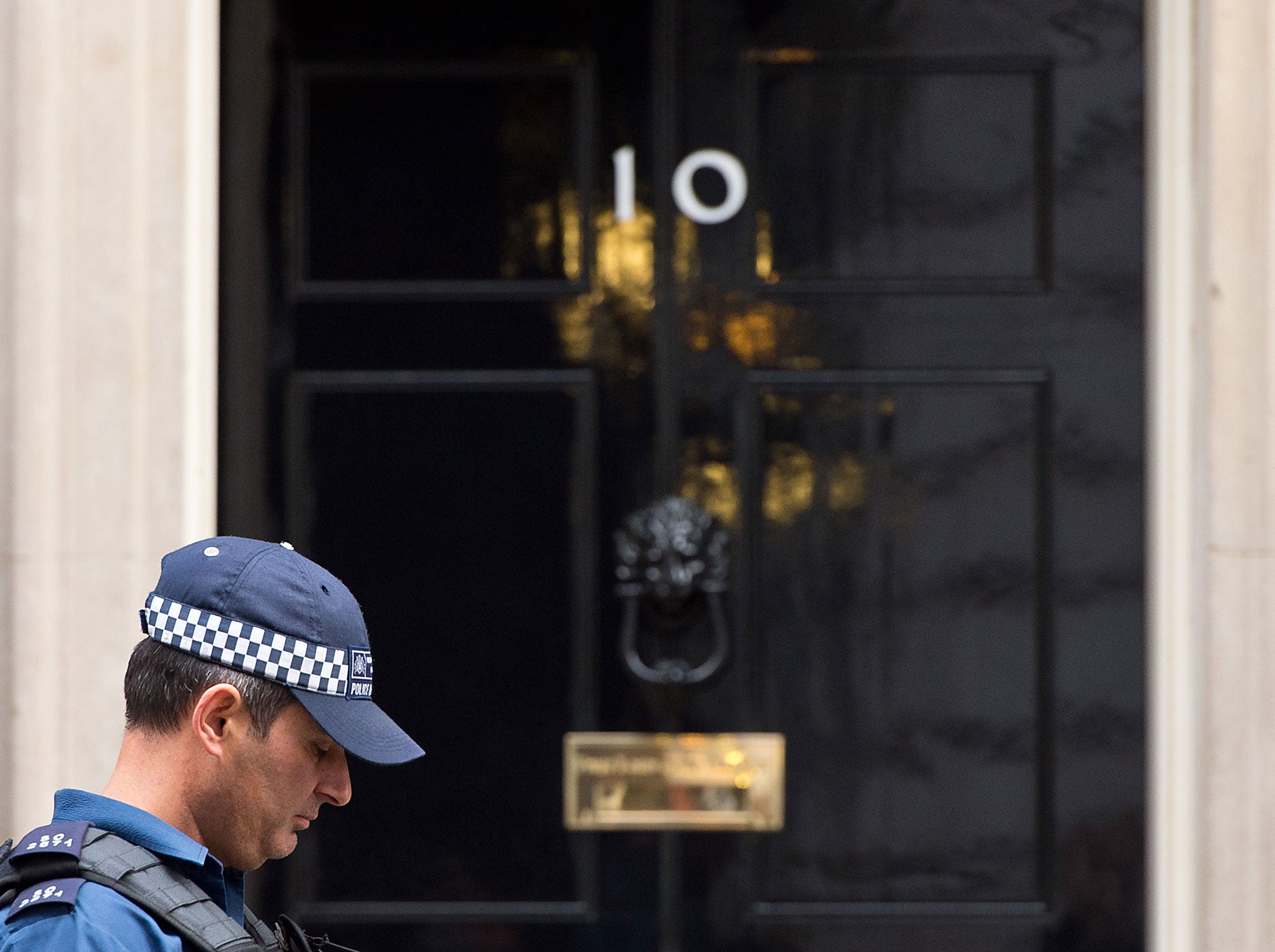 A policeman stands outside Number 10 Downing Street on November 16, 2015 in London, England. Security in London has tightened after a series of terror attacks across the French capital of Paris