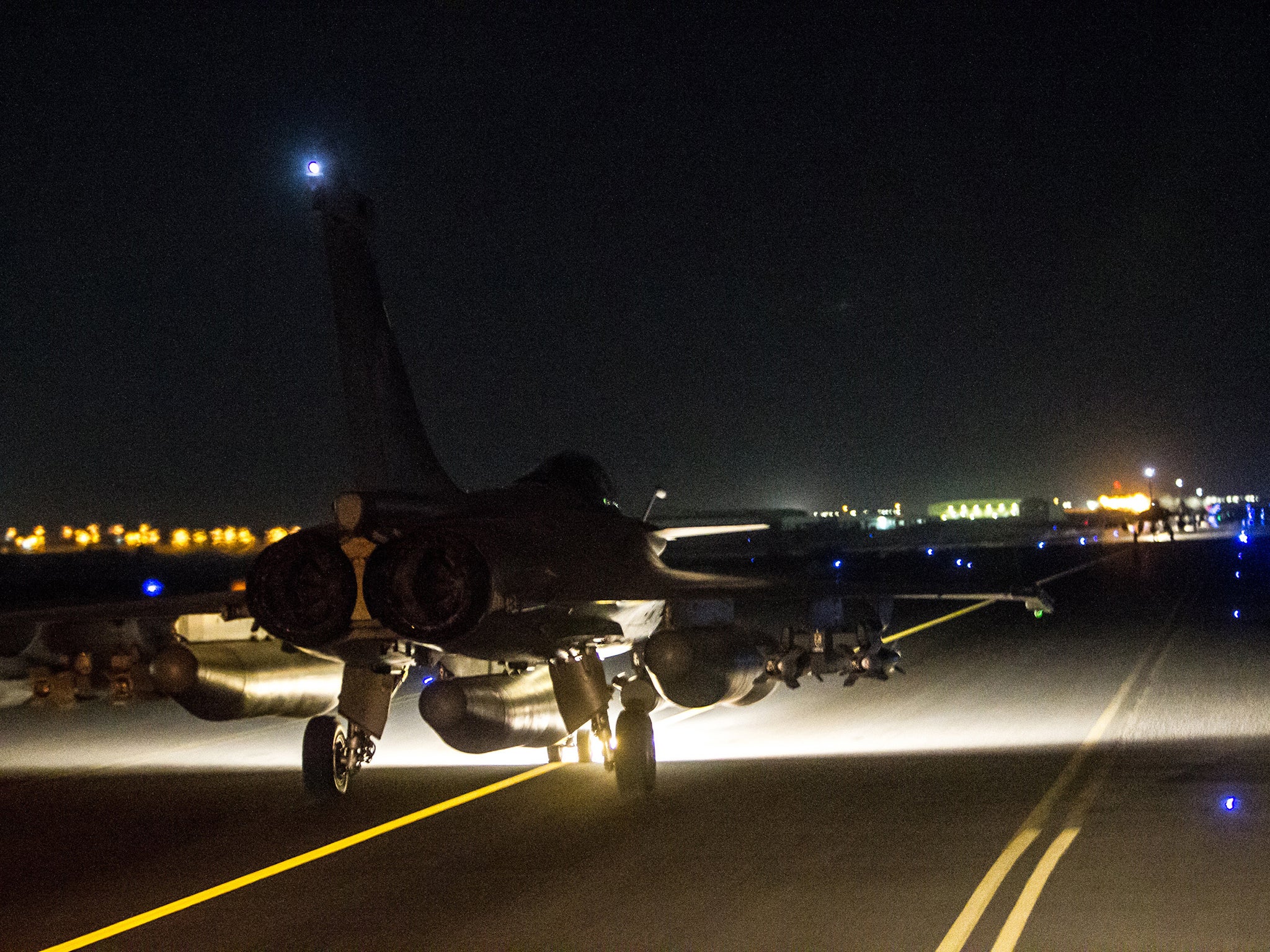 A French army jet at an undisclosed air base in support of the US-led coalition against Isis in September. France has now launched "massive" air strikes on the city of Raqqa