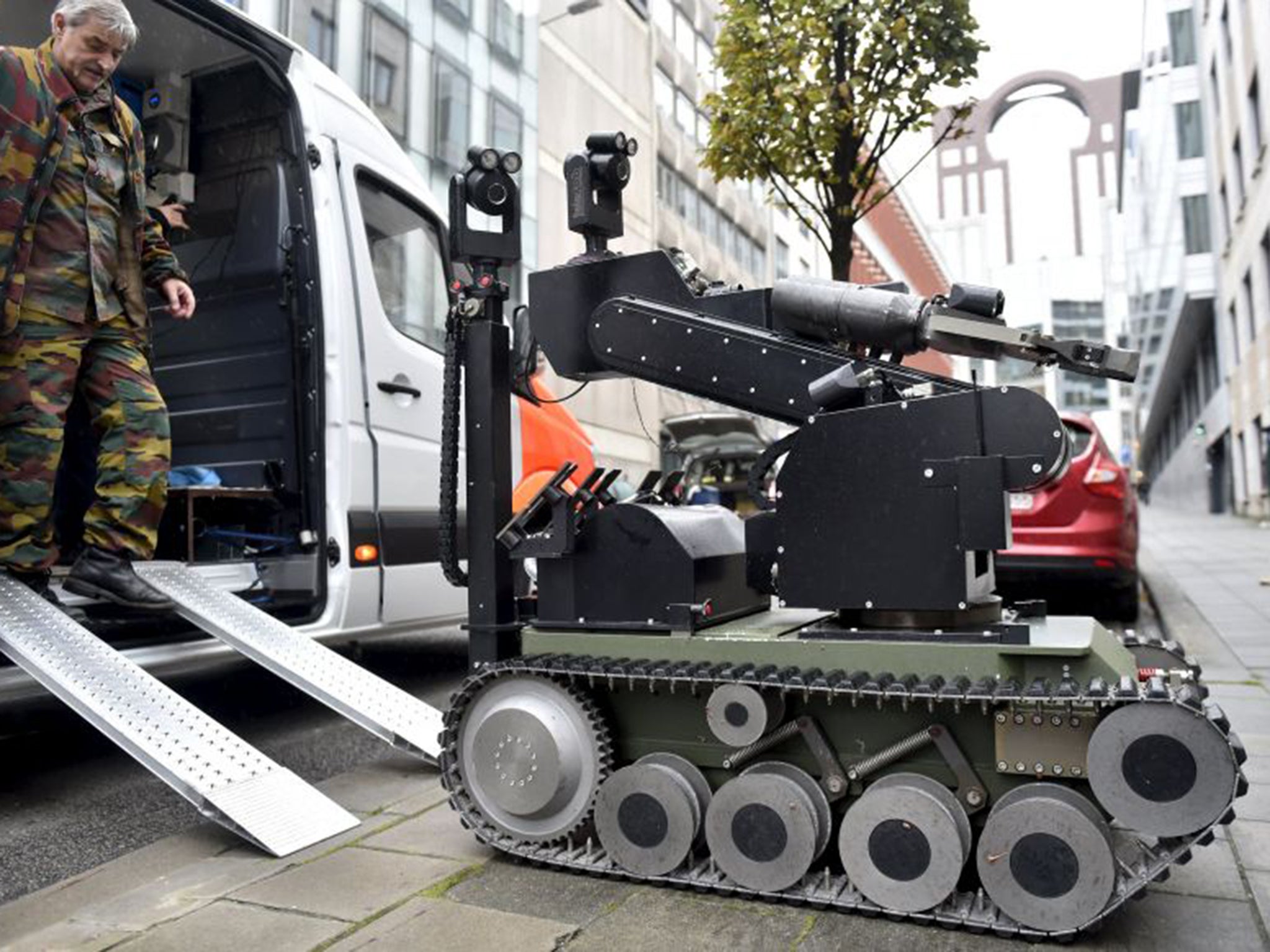 A bomb disposal robot is deployed following an alert in Brussels