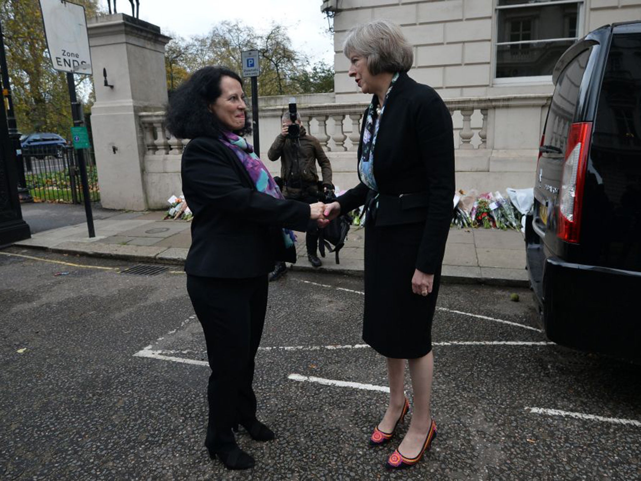French ambassador to London Sylvie Bermann, left, and Theresa May at the French Embassy in London
