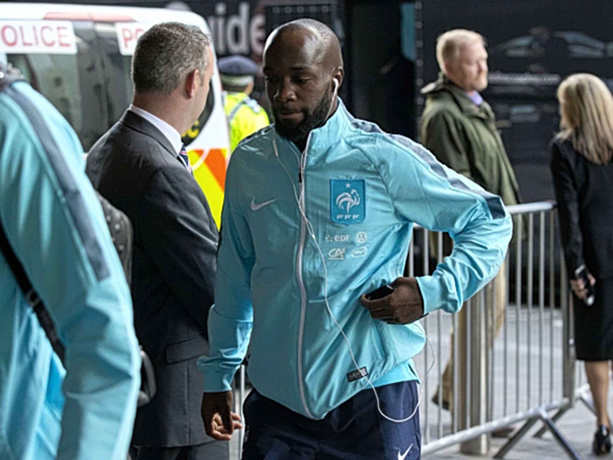 France midfielder Lassana Diarra, whose cousin was killed in the Paris attacks, arrives at the team’s London hotel