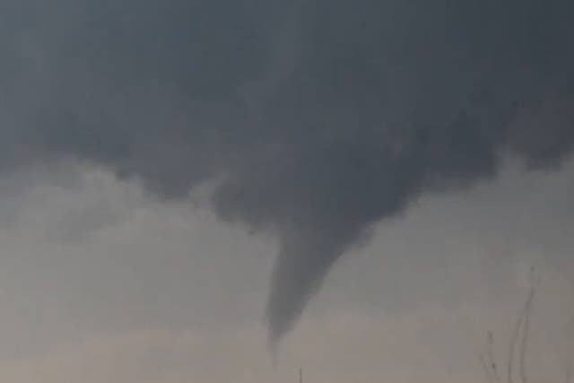 The tornado was a mile (1.6km) long and was whirling at speeds of around 93mph