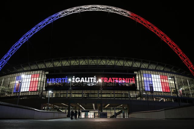 Wembley lit in the colours of the French flag