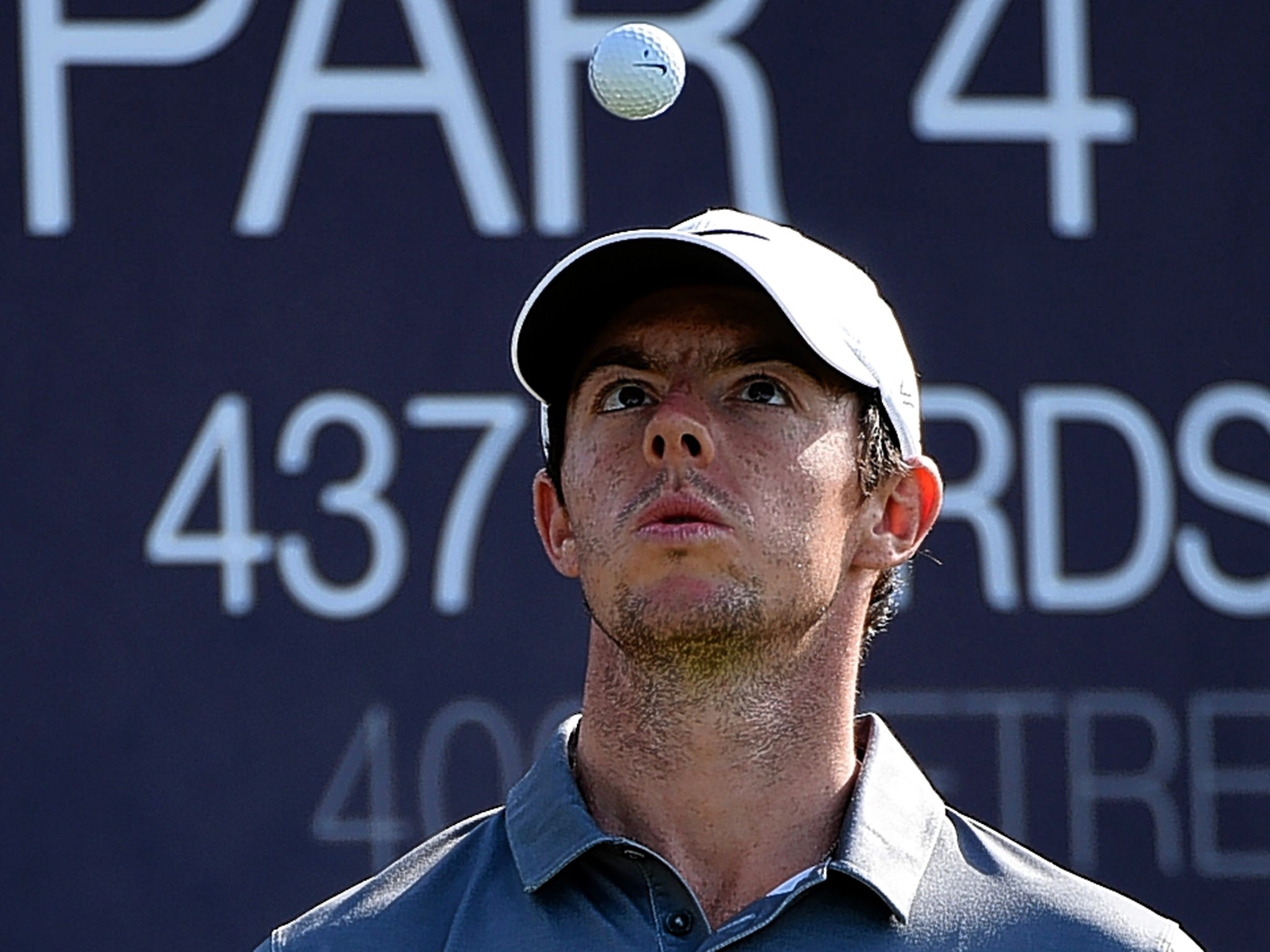 Rory McIlroy keeping his eyes on the ball during a pro-am event in Dubai