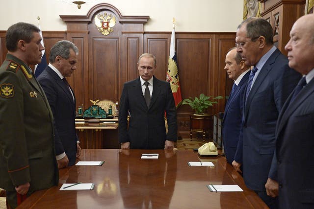 Alexander Bortnikov (3rd from right), head of the Federal Security Service and Mikhail Fradkov, director of Foreign Intelligence Services (right), are both concerned by the sanctions
