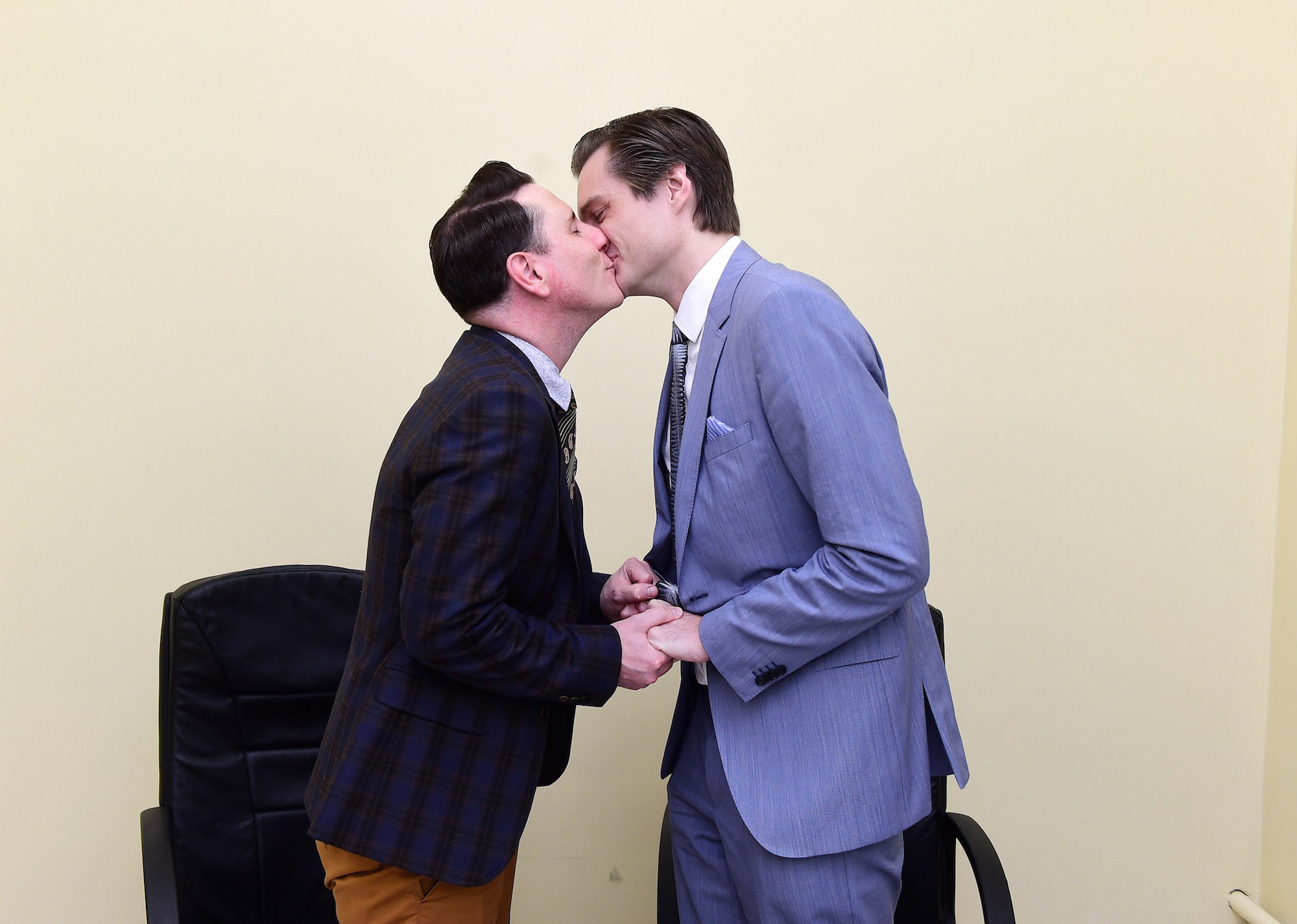 &#13;
Richard Dowling, left, and Cormac Gollogly, right, kiss after Ireland's first same-sex marriage. Charles McQuillan/Getty&#13;