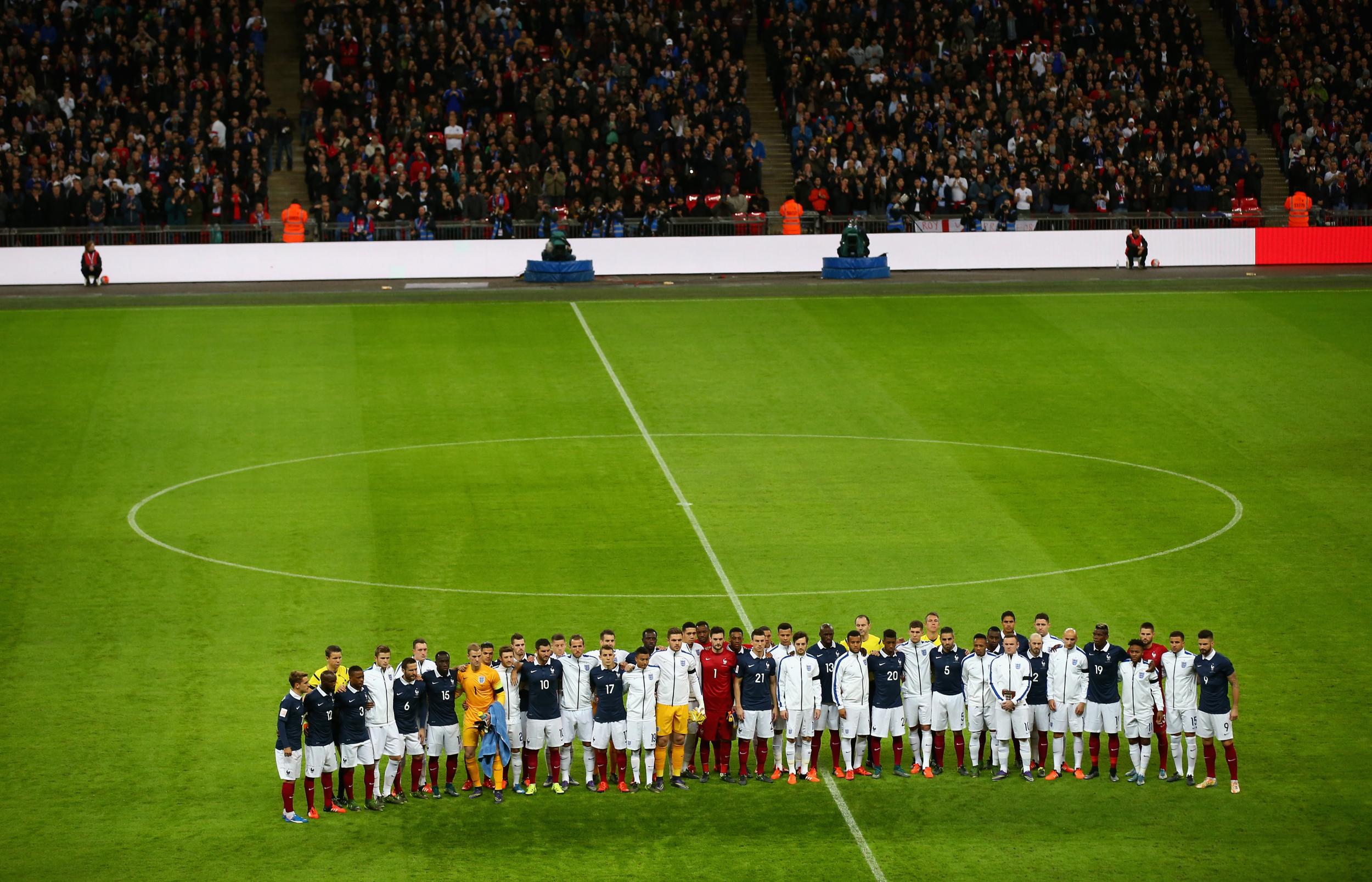 England and France international players line up side-by-side before tonight's friendly.