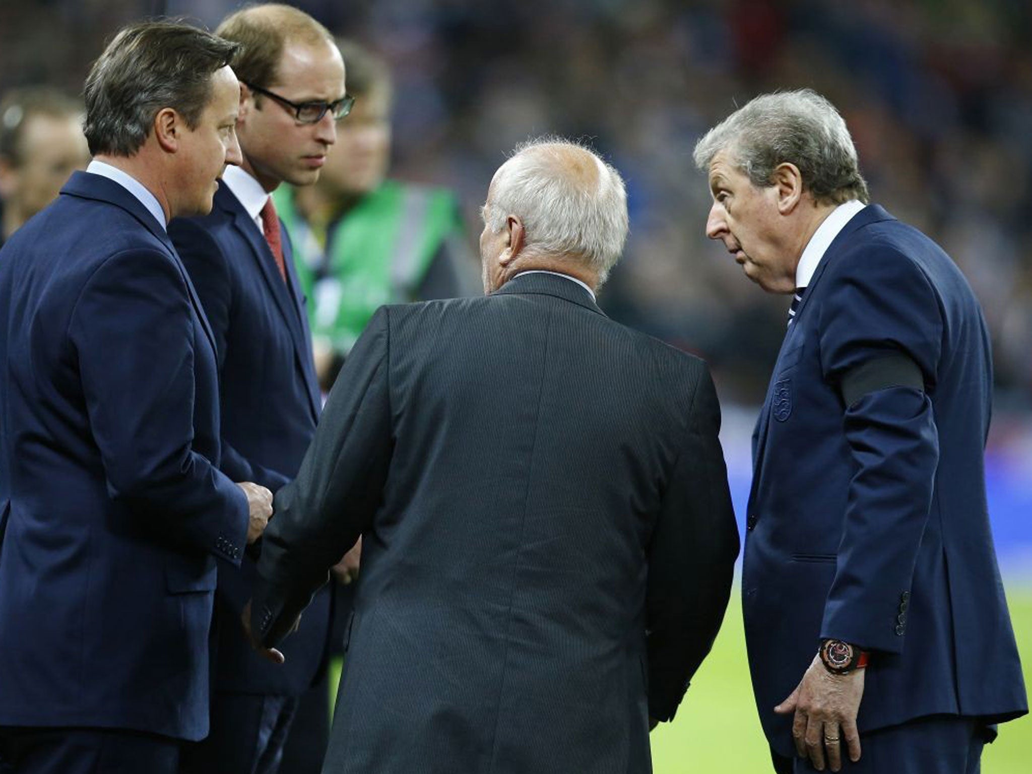 England manager Roy Hodgson speaks with FA Chairman Greg Dyke, Britain's Prince William and David Cameron before the Wembley match against France