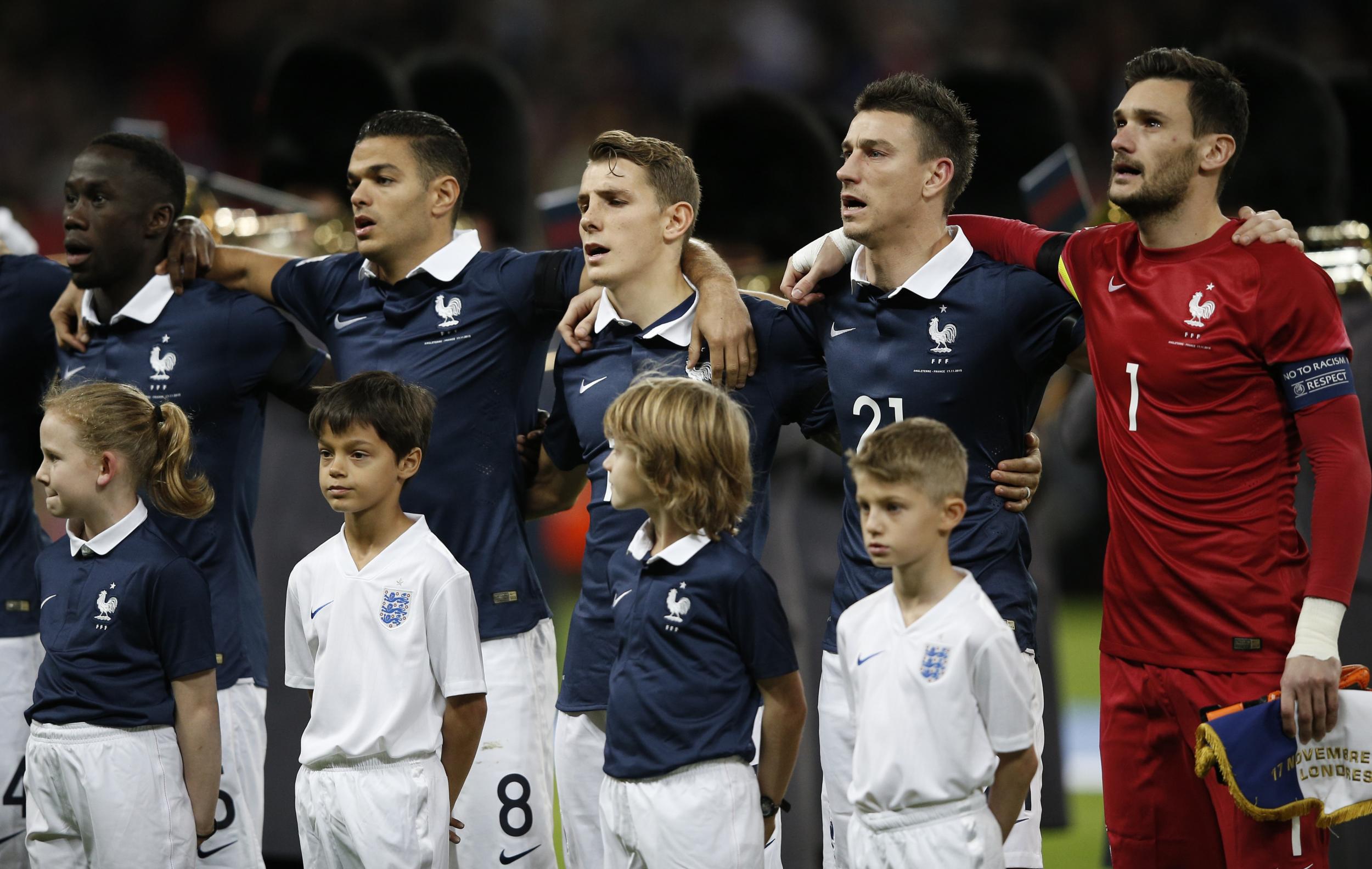 The French team during the rendition of 'La Marseillaise'