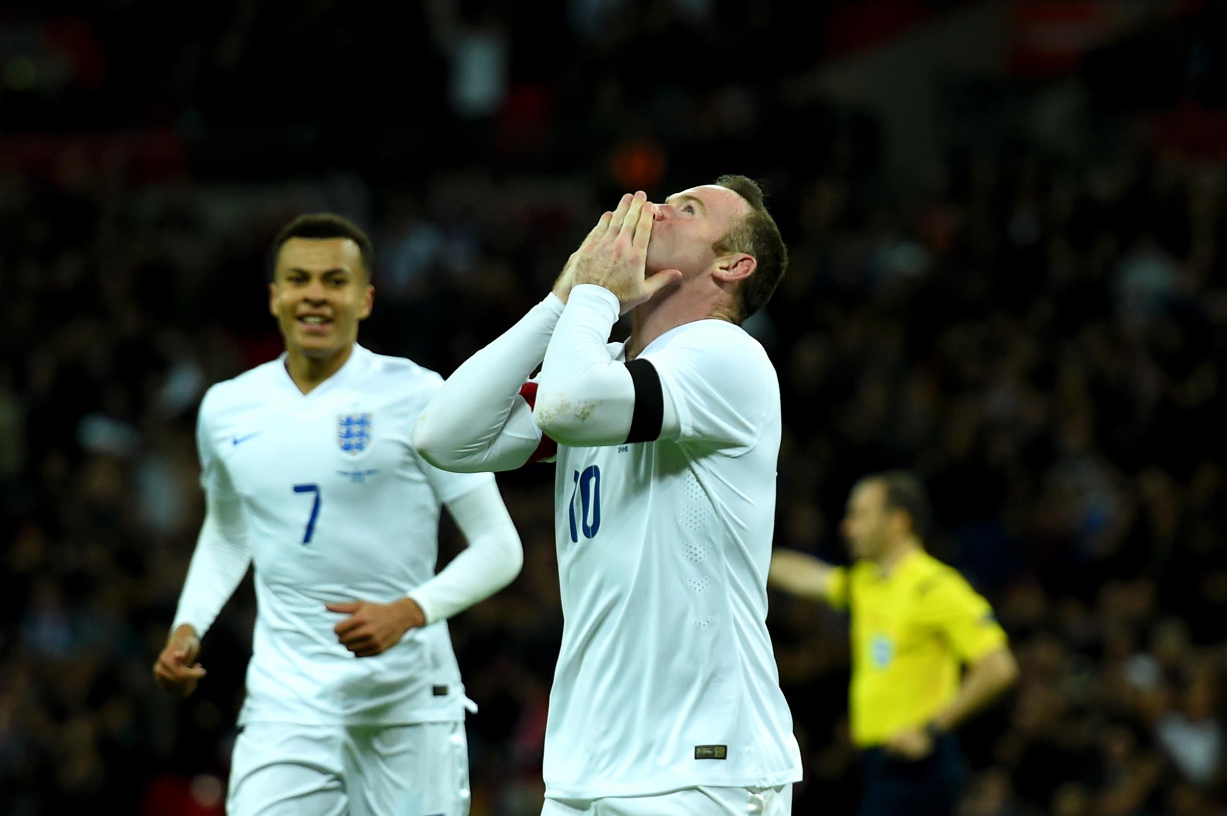 Wayne Rooney celebrates scoring England's second