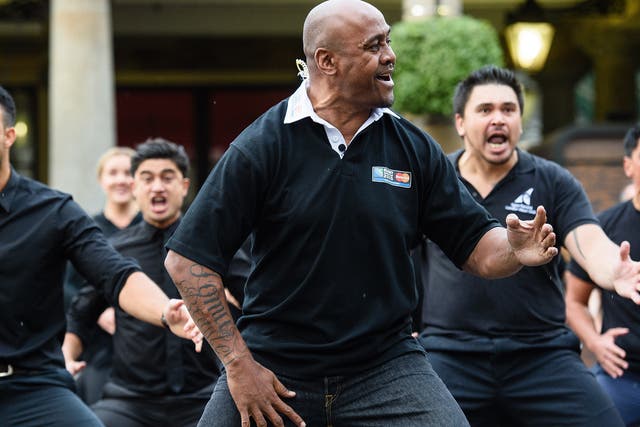 Former New Zealand rugby union player Jonah Lomu (C) and members of the Ngati Ranana London Maori Club take part in a haka