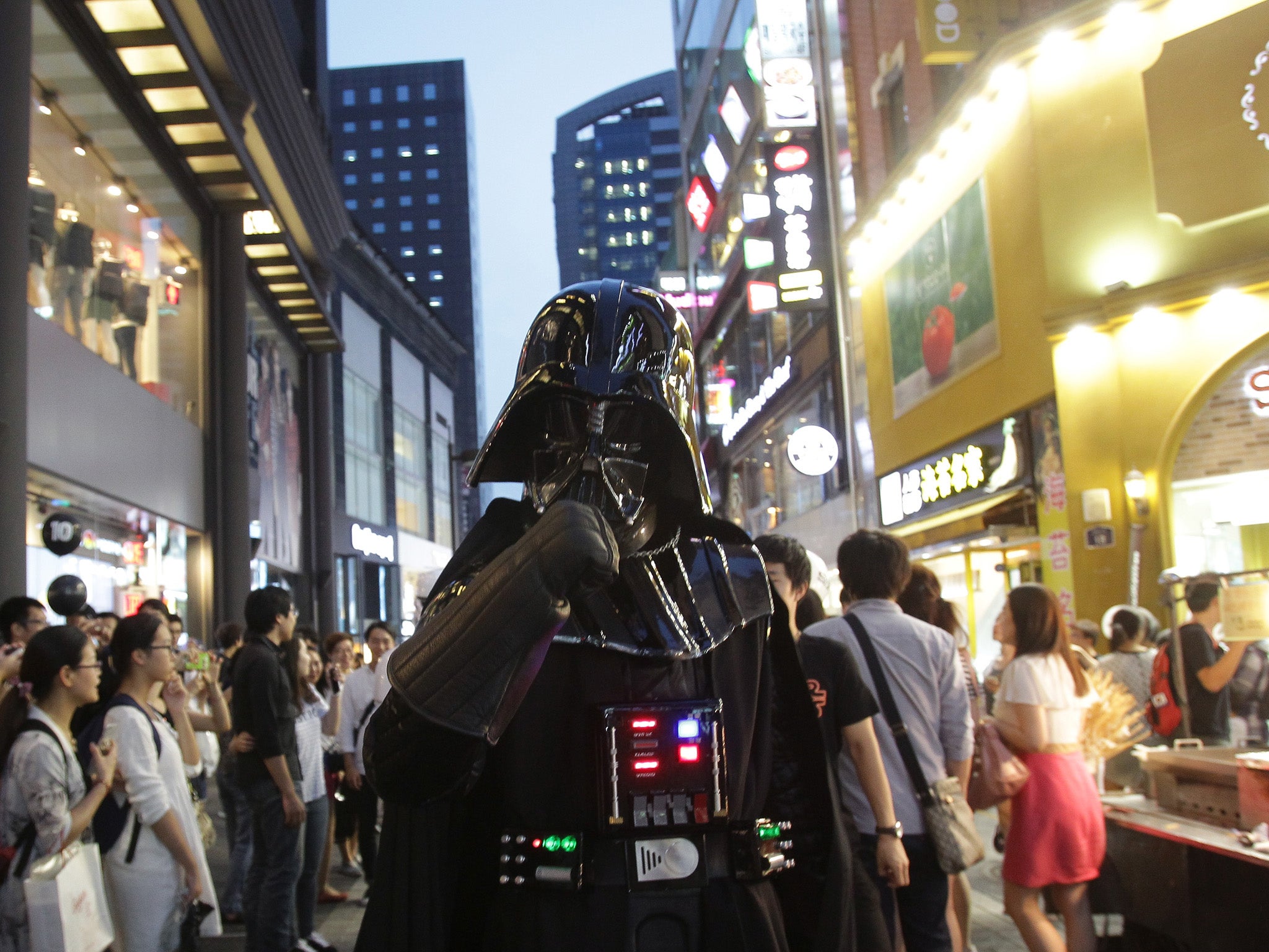 A South Korean man dressed in a Darth Vader during the 'Star Wars - Force Friday' in Myeongdong shopping district on September 4, 2015 in Seoul, South Korea.