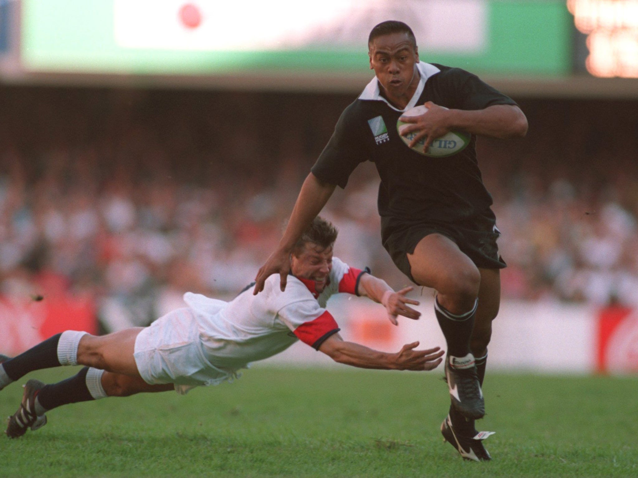 Jonah Lomu powers to a try against England at the 1995 Rugby World Cup