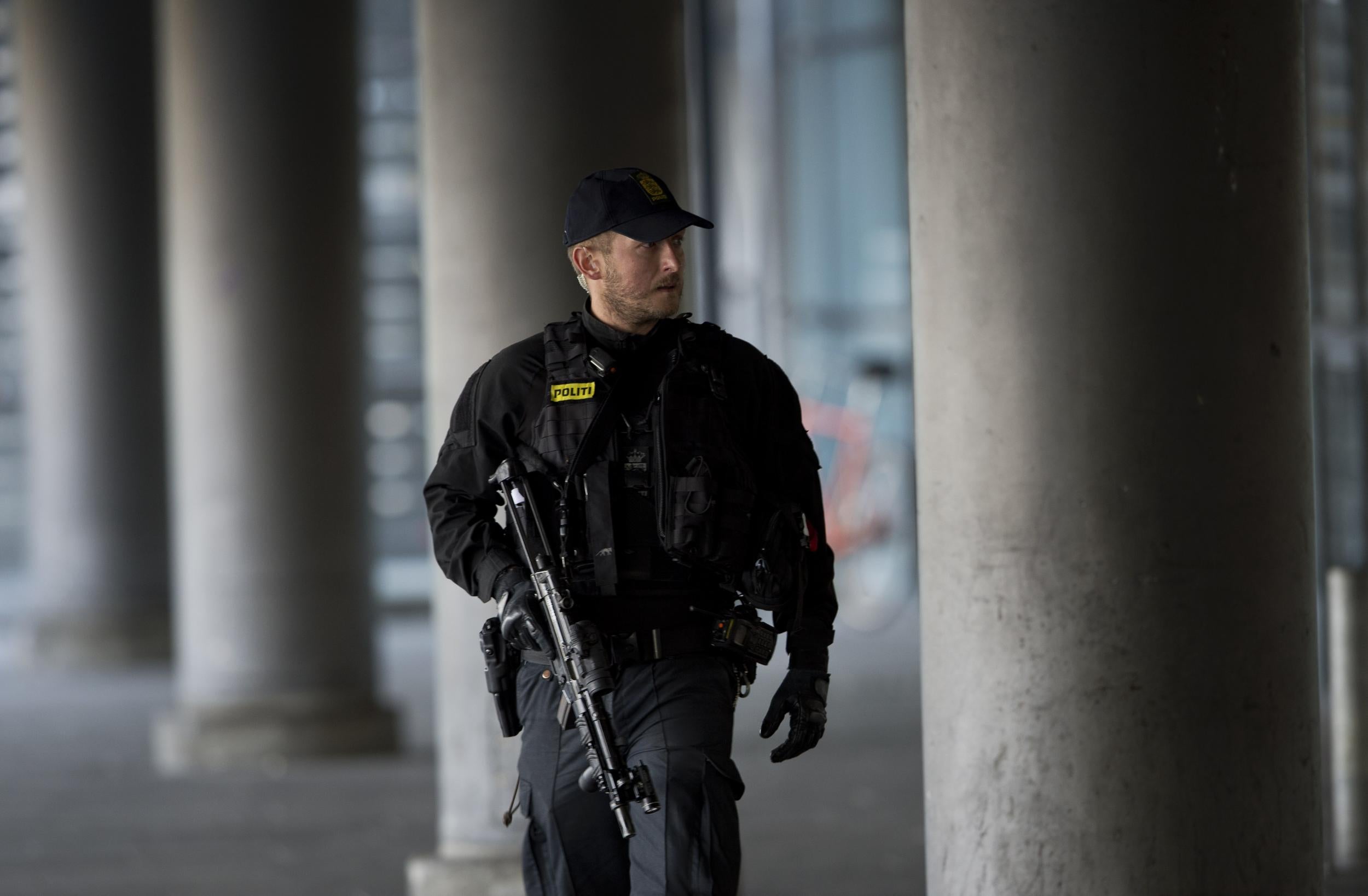 A policeman stands guard outside terminal 3 at Kastrup airport