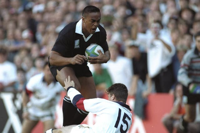 Jonah Lomu charges through Mike Catt in 1995 Rugby World Cup