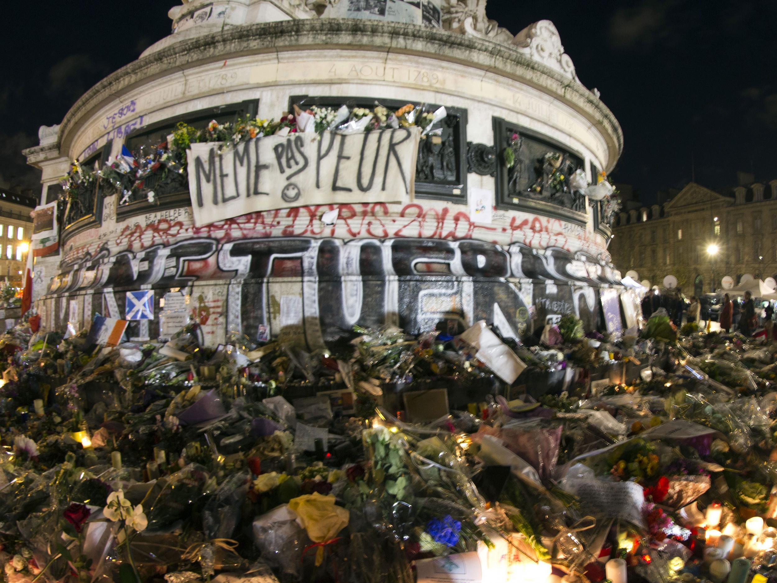 Parisians have laid flowers at the Place de La Republique to pay tribute to the dead