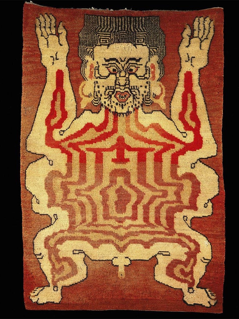 A carpet showing the image of a flayed man