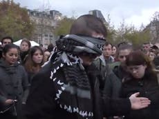 Blindfolded Muslim man asks people to 'hug him' after Paris shootings 