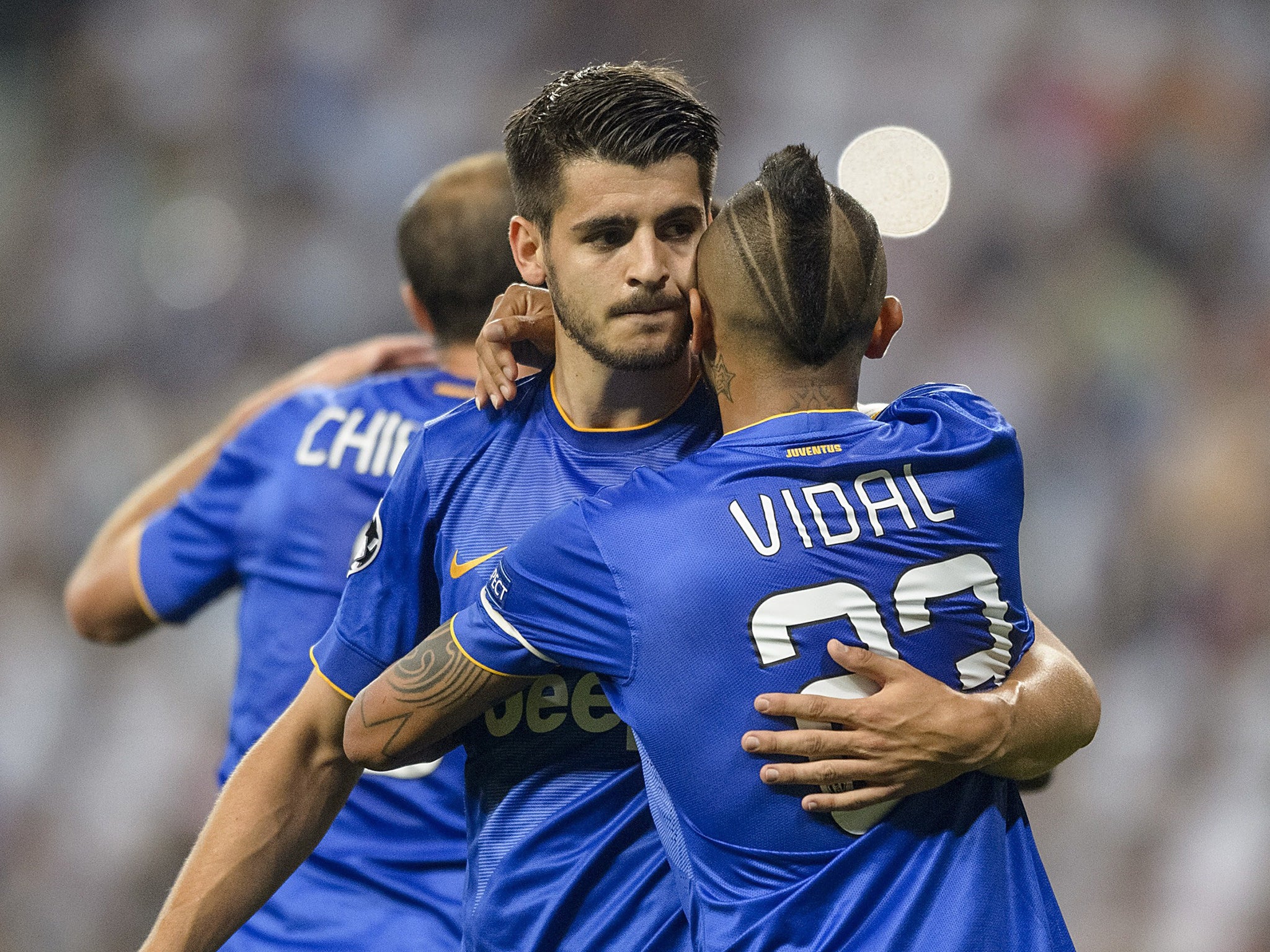 Alvaro Morata is congratulated on his goal in the Santiago Bernabeu