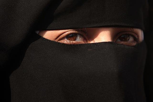 David Cameron has said he will back the right of schools, courts and other British institutions to ban Muslim women from wearing veils