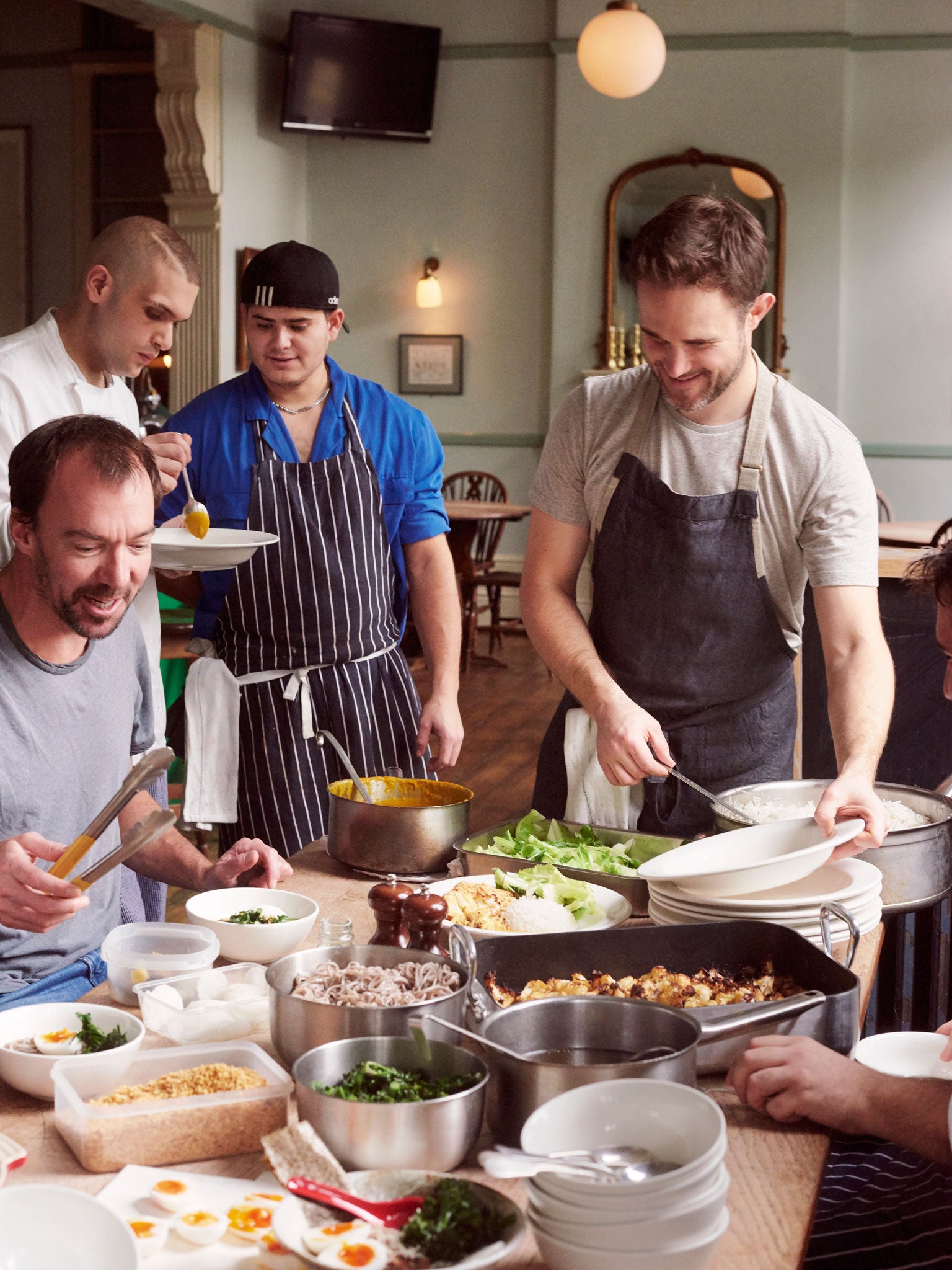 Ed Smith, right, serves up at the Draper's Arms