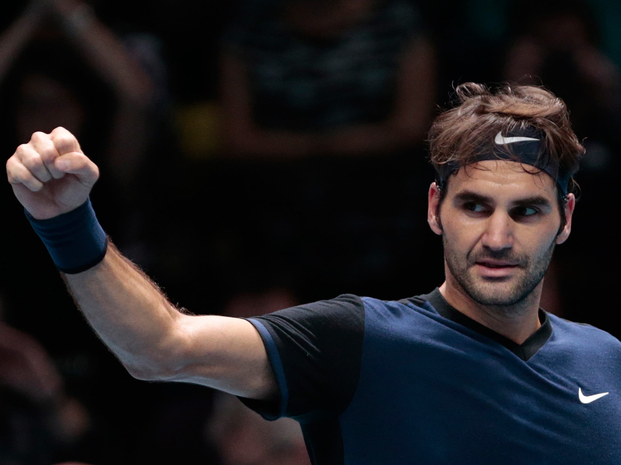 Roger Federer won his group with a third victory of the week, against Kei Nishikori