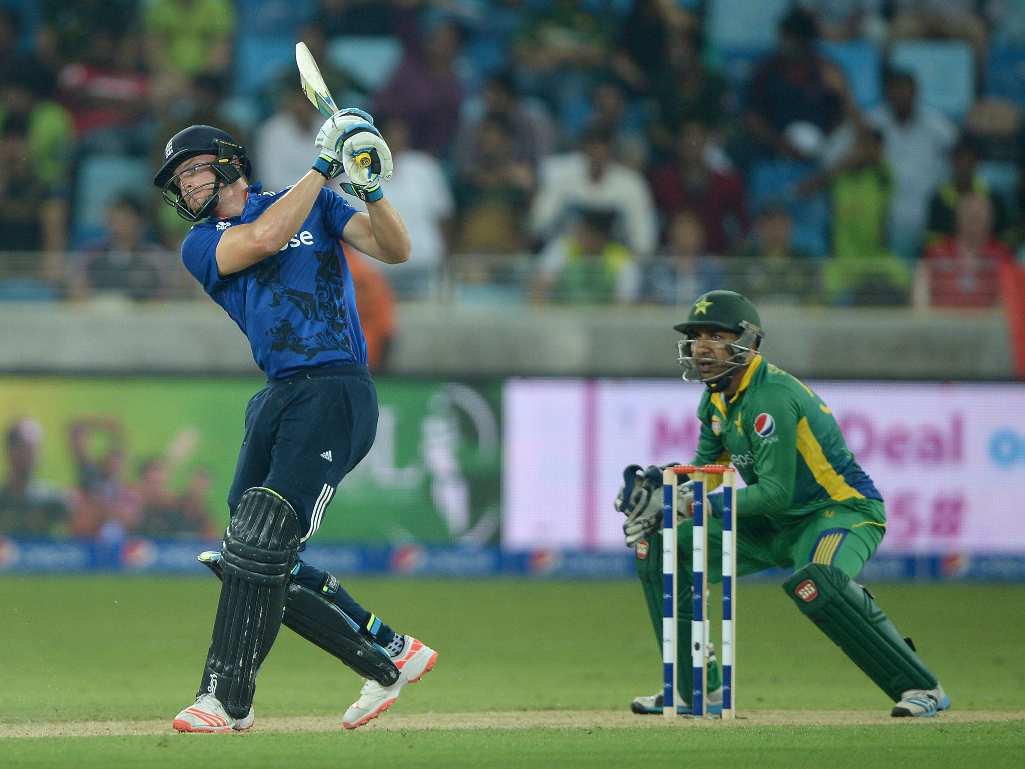 Jos Buttler hits a six on his way to 116 off 52 balls