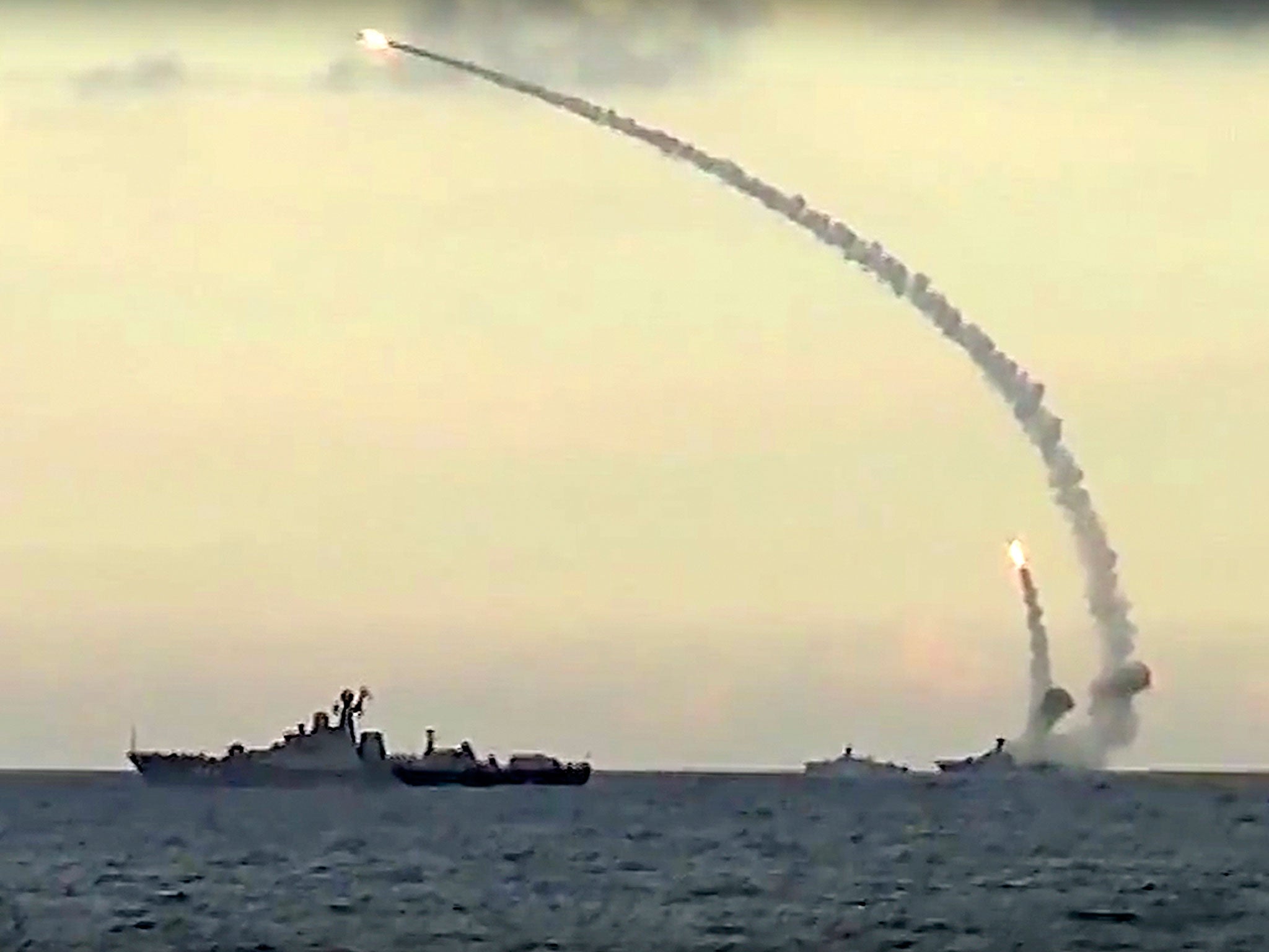 Russian navy ships launch cruise missiles at targets in Syria from the Caspian Sea, according to information released by the Defense Ministry