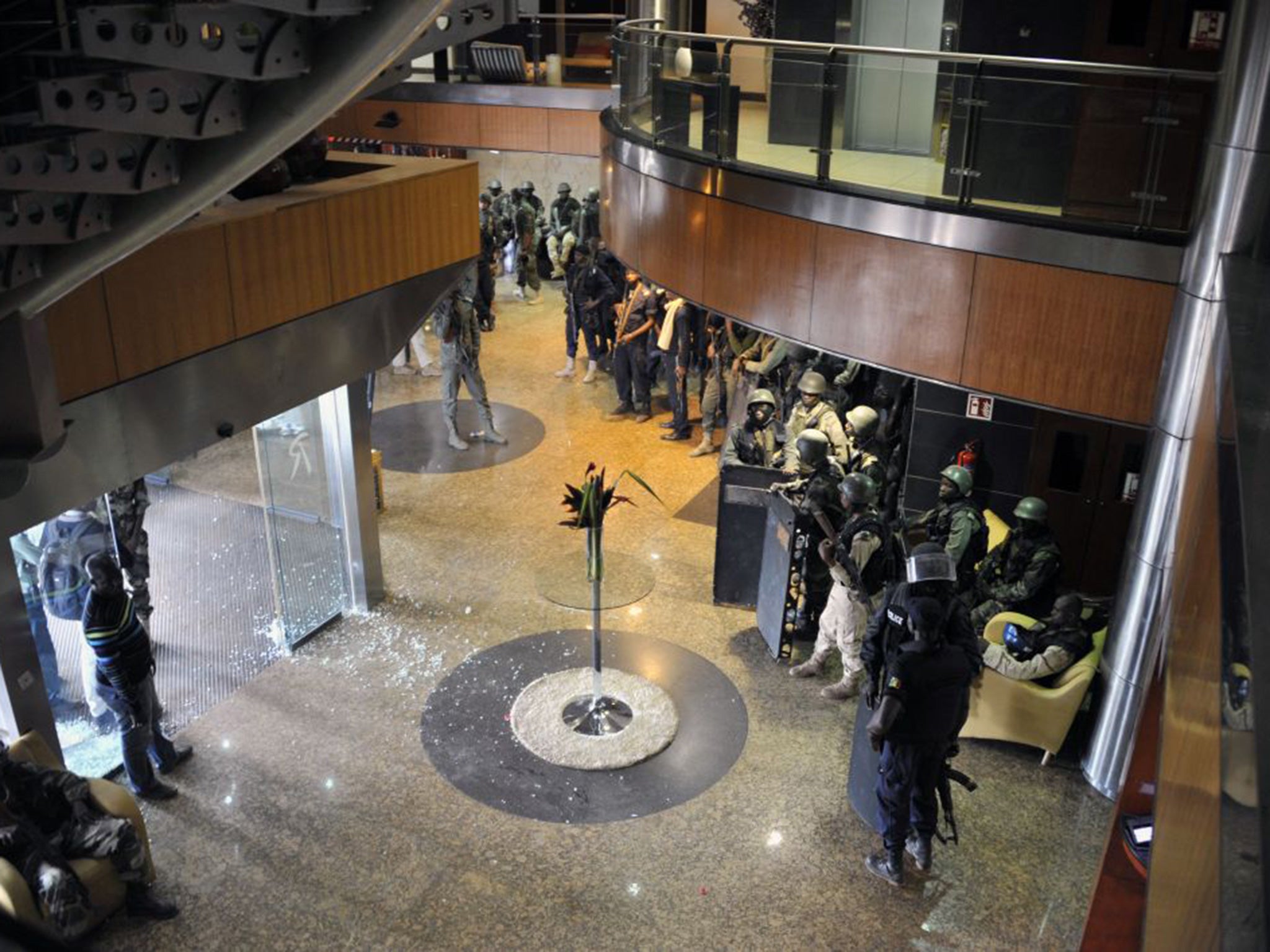 Members of special forces are seen inside the Radisson Blu after suspected Islamist gunmen stormed the hotel in Mali's capital